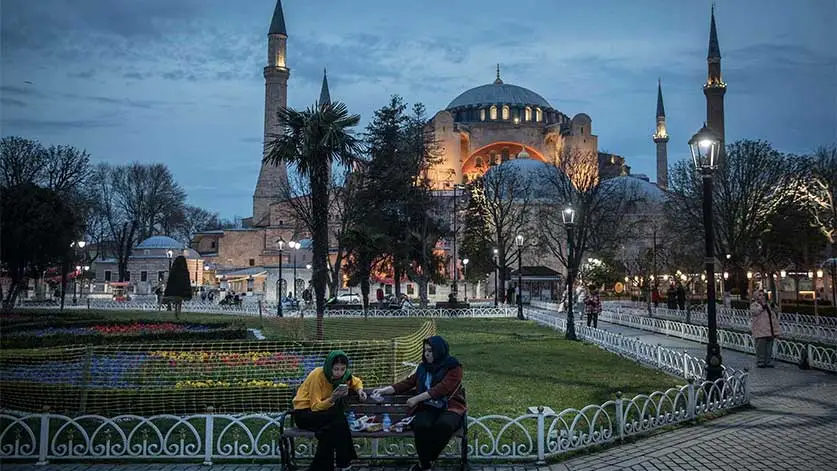 Women wearing hijab outside a mosque in Turkey