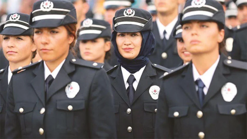 A woman in the police wearing hijab with her uniform