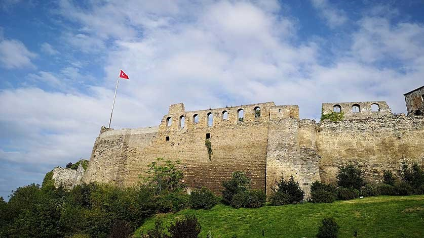 Trabzon Castle in nature with a Turkey flag