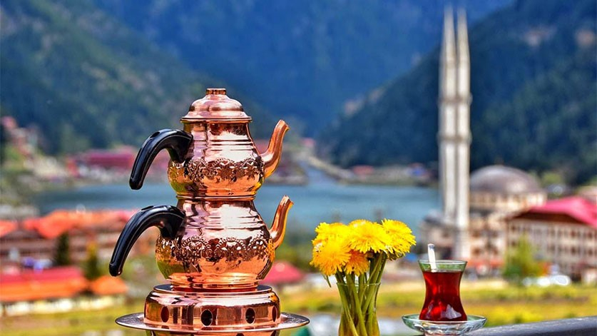 View of Uzungol lake in the background of tea kettle 